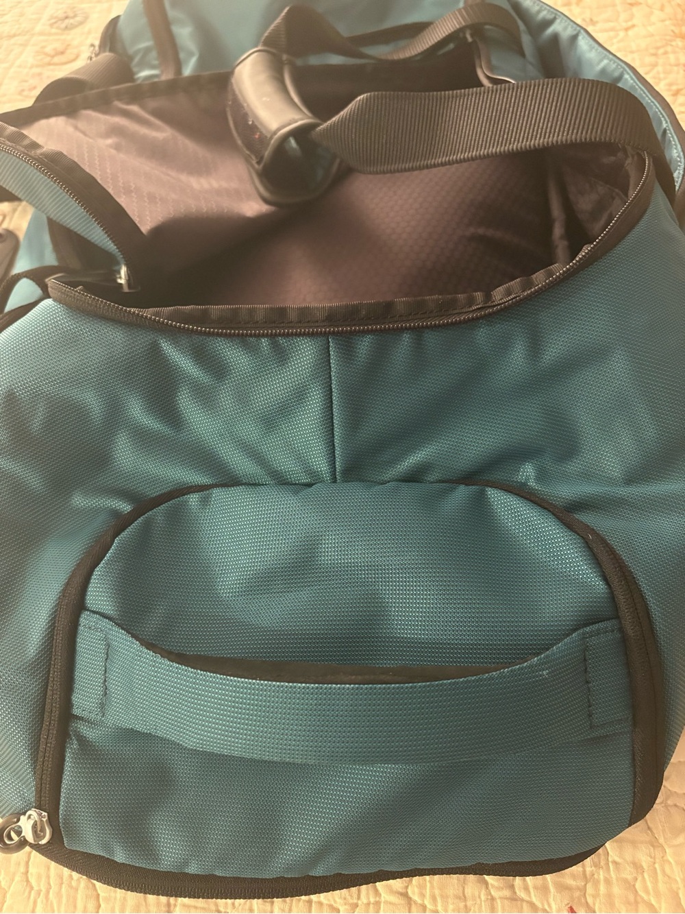 Tumi Teal Travel Duffel / backpack 
Very roomy to store things in very sturdy - Picture 10 of 13